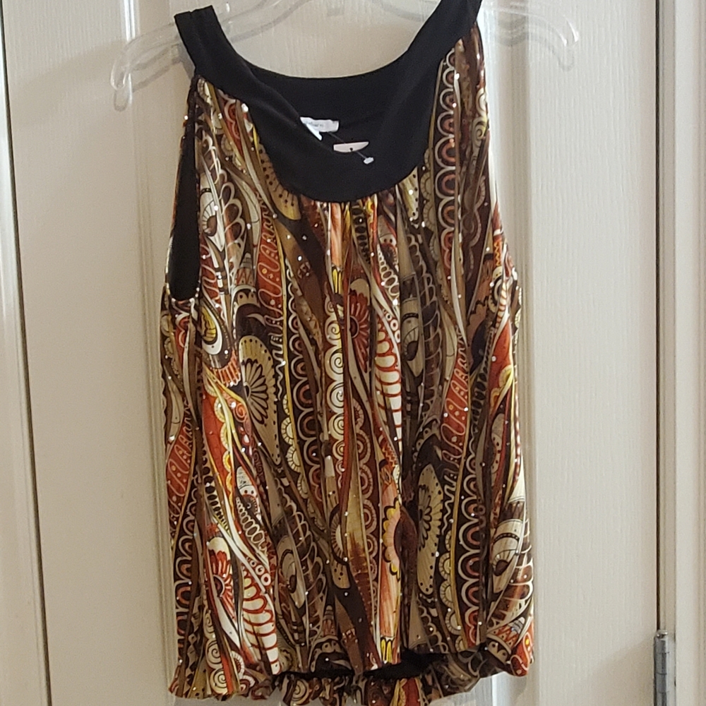 New with tags! Dress Barn sleeveless blouse with sequins accents.
